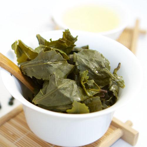 Il tè fatto a mano di Kuan Yin del Ti del tè di Oolong di cinese con la verniciatura leggera del gelo compare
